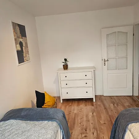 Apartament With דירה